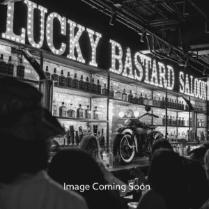 A black and white photo of people at lucky bastard saloon.