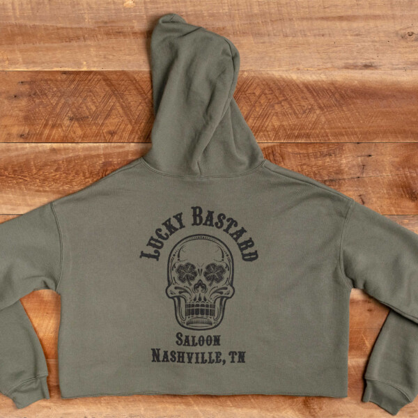 A green LBS cropped hoodie with a skull on it.