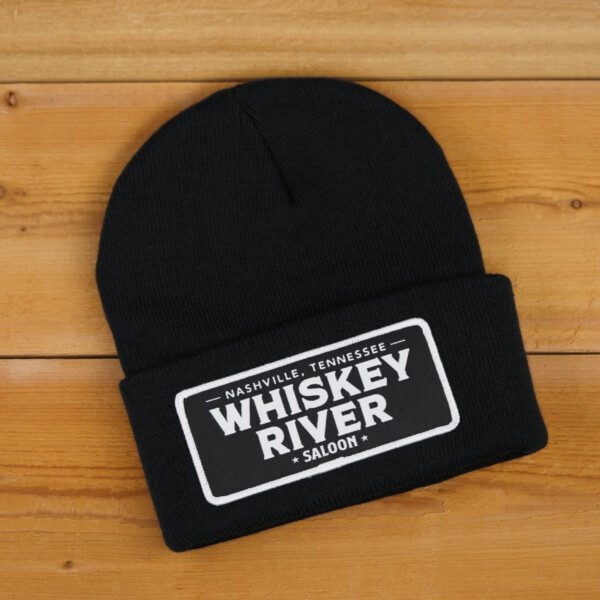 Whiskey river saloon cap in black color and brown background