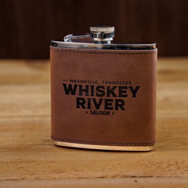 Whiskey river saloon Flask in silver color with leather grip
