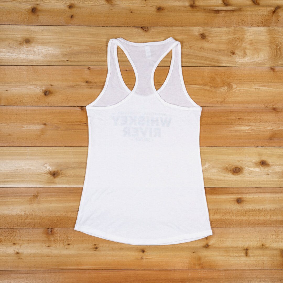 A white tank top on a wooden floor