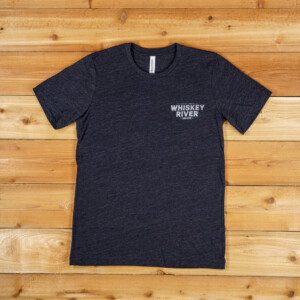A black t - shirt with the word whiskey on it.