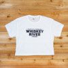 White Crop Tee front Whiskey river saloon Crop Tee in White color on the table