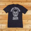 A black t-shirt with a skull on it.